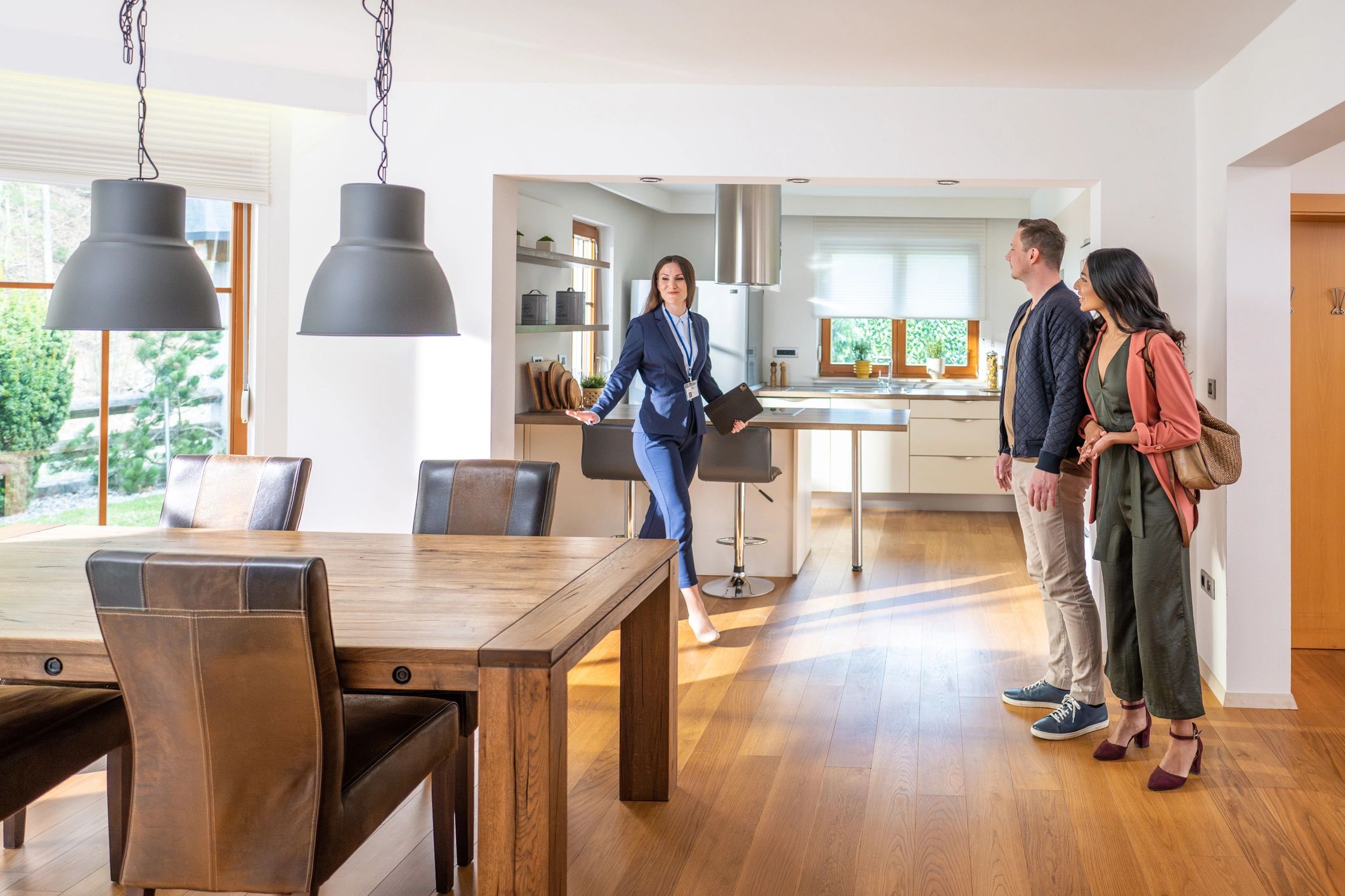 Real estate agent showing a home interior