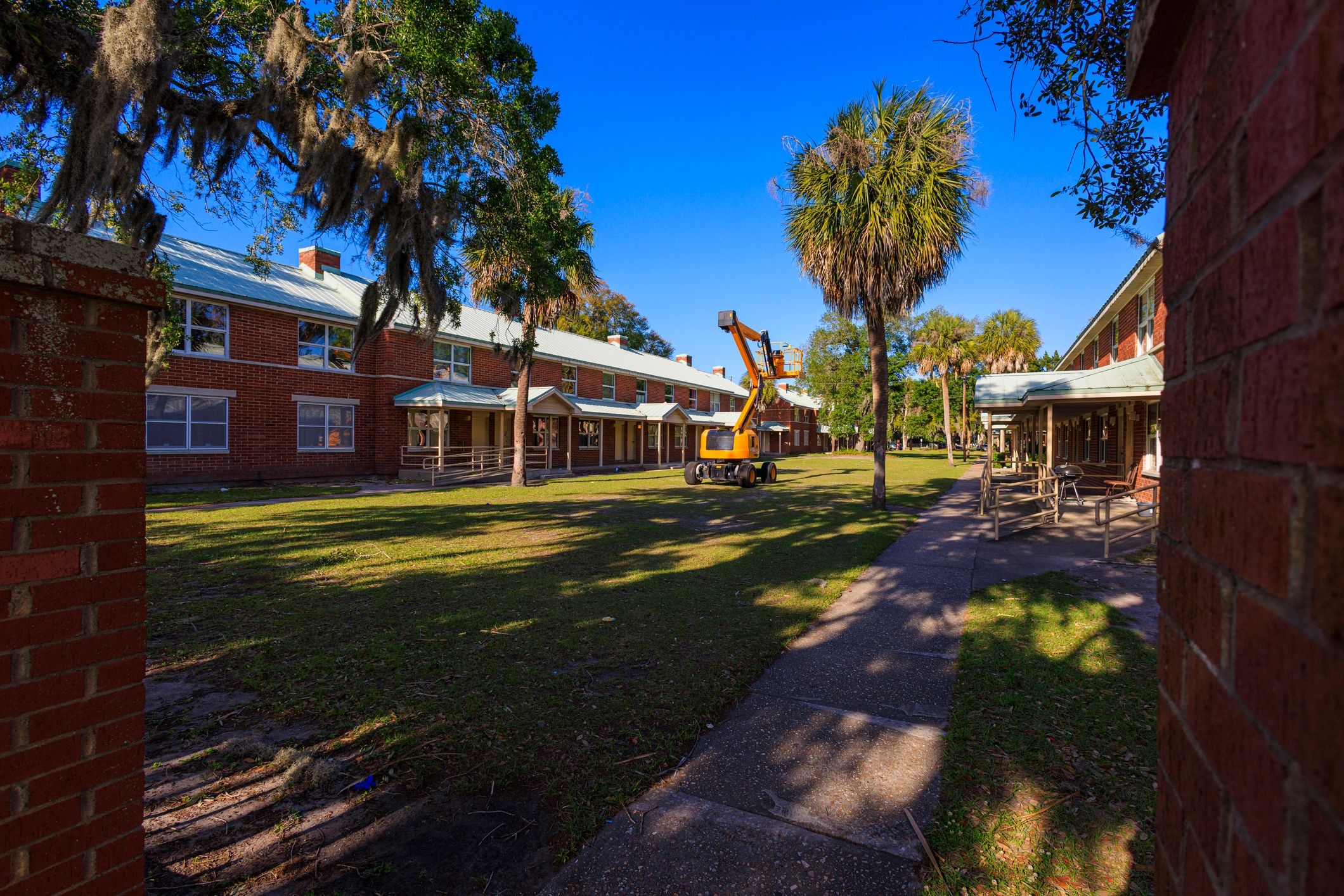 Apartment building exterior representing rental property support